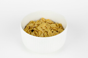 corn flakes in white cup
