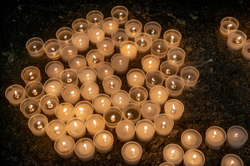 Candles lit in a sacred place
