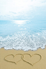 sea sky clouds sand traces drawing of hearts