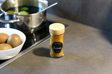 Coloring easter eggs with natural herb curcuma at home