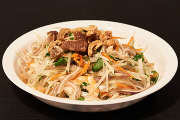 Papaya and pig's ear salad