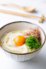 udon noodle with green onion, bonito powder and egg yolk