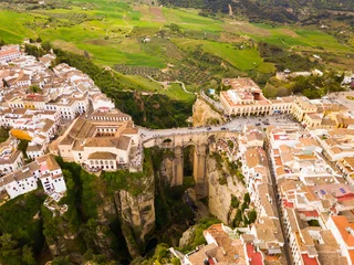 Photo sur Plexiglas Ronda Pont Neuf Aerial view of Ronda landscape and buildings with Puente Nuevo Bridge, Andalusia, Spain
