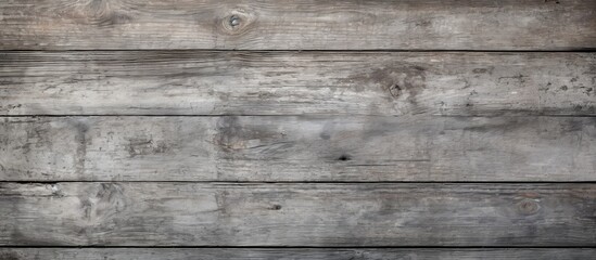 A detailed closeup of a rectangular hardwood wall with a gray wood grain texture resembling brickwork. The pattern adds depth and character to the building material