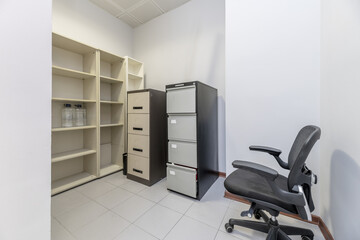 Small room in an office dedicated to filing with furniture for that purpose