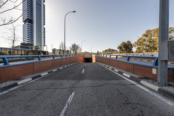 A road with access to a tunnel in an area of office buildings