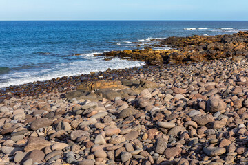 Pebbles on the coast of the Atlantic Ocean in Tenerife