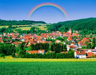 Fotobehang ドイツの美しい田舎町にかかる虹 © san724