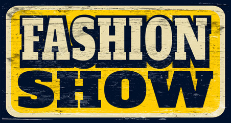 Aged vintage fashion show sign on wood