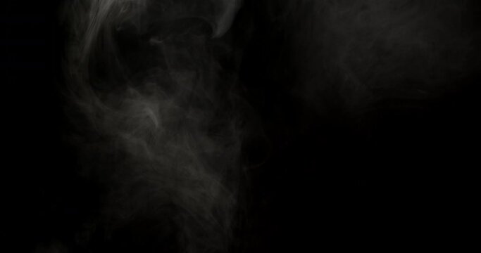 Layers Of White Smoke On Black Background