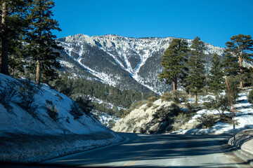 Fototapeta na wymiar Icy Peaks: Dramatic Winter Mountain Scenery