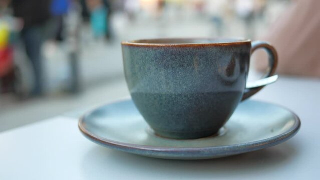 late coffee on cafe table at cafe background 