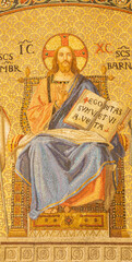 MILAN, ITALY - MARCH 6, 2024: The mosaic of Jesus the Pantokrator and Teacher in the church Basilica di San Babila by  workroom Murano-Venezia (1929).