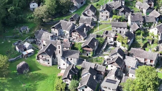 Stone village by Foroglio Waterfall, Tessin, Switzerland - aerial