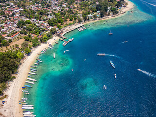 Aerial view of a busy tourist port area on a small tropical island (Gili Air, Lombok, Indonesia)