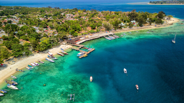 Aerial view of a busy tourist port area on a small tropical island (Gili Air, Lombok, Indonesia)