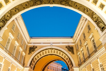 The arch of the ancient palace in the evening against the sky in St. Petersburg.