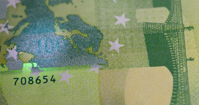 European Union Euro cash close-up, details of genuine euro cash in ultraviolet light