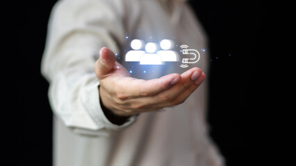 Digital Marketing Media Technology Graphic Concept, Business Lead And Customer Generation Magnet Pulling Figures, Businessman using mobile smart phone	