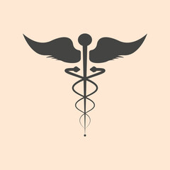 caduceus medical symbol on black background