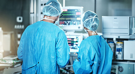 Surgery, back or surgeons with teamwork for emergency, accident or healthcare in hospital clinic....
