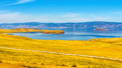 View from Olkhon island to Maloe More or Small Sea of lake Baikal and mainland near Yalga village. Picturesque summer landscape, beautiful natural background. Discovering distant places of Earth