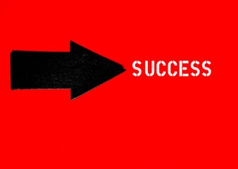 On red background - arrow direction points to SUCCESS,  focus and aim to what matter most in career...