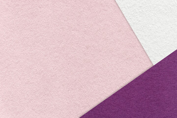 Texture of craft light pink color paper background with white and purple border. Vintage abstract rose cardboard.