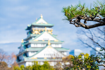 Landscape view Osaka's landmark Osaka Castle castle tower that shines in the blue sky, Osaka Japan.
