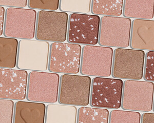 Minimal pattern of eye shadow beige tones swatches, monochrome photo background, eyeshadow with heart imprint, shiny natural shades powder makeup, square shape metal pack, beauty cosmetic texture