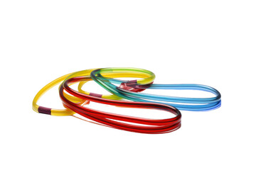 Vibrant Elastic Symphony: A Quartet of Colorful Rubber Bands. On White or PNG Transparent Background.