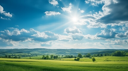 Splendid summer panorama showcasing blue skies, sun-dappled landscapes, and lush grass