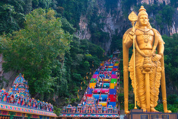 Batu Caves, Kuala Lumpur, July 21, 2023: New view with colourful staircase at Murugan Temple Batu Caves has become a new tourist attraction in Malaysia - obrazy, fototapety, plakaty