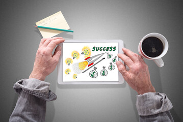 Business success concept on a tablet