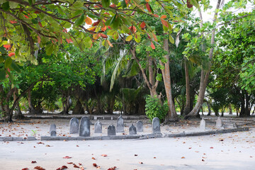 The graveyard with stone tombs for local villager at Mathiveri. Mathiveri is one of the westernmost islands in the Maldives; it's another inhabited island located in Alif Alif Atoll. 