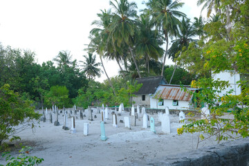The graveyard with stone tombs for local villager at Mathiveri. Mathiveri is one of the westernmost islands in the Maldives; it's another inhabited island located in Alif Alif Atoll. 