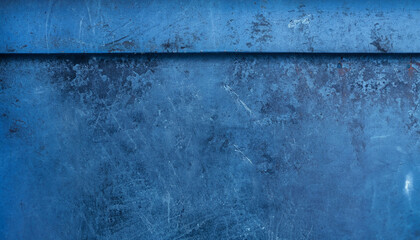 Dark blue shabby metal texture, abstract background with scratches; horizontal industrial photo