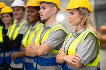 Portrait cross arm Caucasian engineer woman with team engineer at factory - 767647132