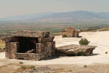 Tomb at the ancient site of Hierapolis sunken submerged in the limestone deposits of the...