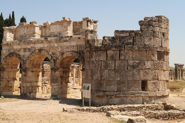 Fototapeta premium The Domitian Gate at the ancient ruins of Hierapolis, next to Pamukkale, Denizli, Turkey