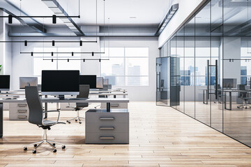 A modern office interior with desks, chairs, and computers, lots of natural light from large windows, and a cityscape view. 3D Rendering