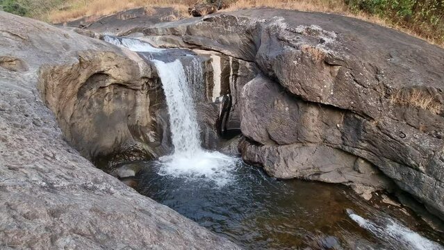 View of Kozhippara waterfalls in Kakkadampoyil, Calicut, India. 
