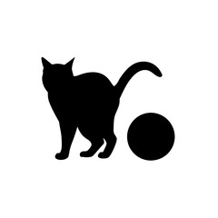 a cat playing with a ball