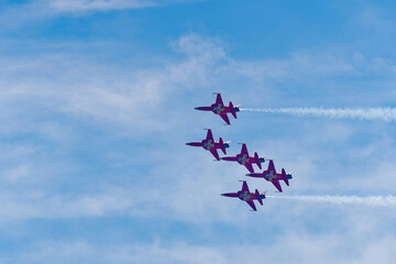 Patrouille Suisse doing aerobatics at Swiss Army exhibition at training ground of Swiss City of Kloten on a sunny summer day. Photo taken August 18th, 2023, Zurich Kloten, Switzerland.