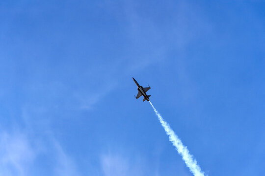 Patrouille Suisse doing aerobatics at Swiss Army exhibition at shooting range of Swiss City of Kloten on a sunny summer day. Photo taken August 18th, 2023, Zurich Kloten, Switzerland.