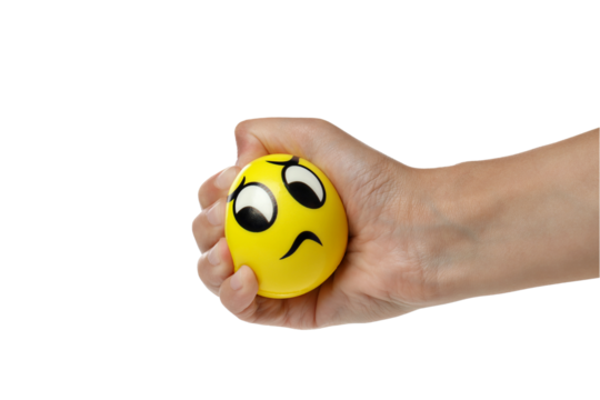 PNG, yellow ball, smiley clenched in hand, isolated on white background.