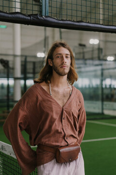 Man play padel tennis on an indoor court, Bali.