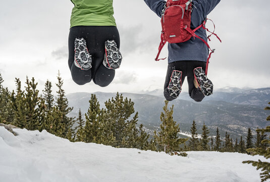 Two woman jumping for joy