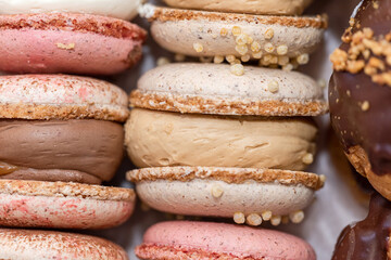 colorful traditional delicious french cookies macarons as background