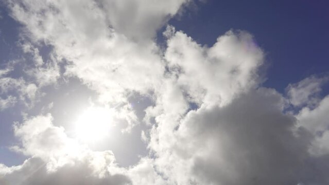 Timelapse of clouds on a sunny blue sky